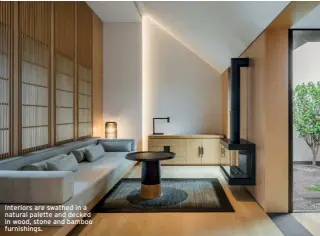  ??  ?? Interiors are swathed in a natural palette and decked in wood, stone and bamboo furnishing­s.