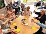 ?? ?? Happy residents raise a glass to the highly-rated Fernlea care home