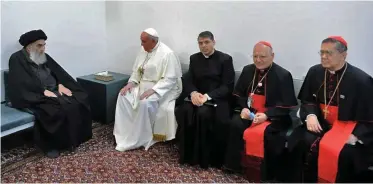  ?? AFP ?? THIS picture released by Ayatollah Sistani’s media office shows Iraq’s most revered Shia cleric, Grand Ayatollah Ali al-Sistani (L) meeting Pope Francis and his delegation in the holy city of Najaf, on March 6, 2021. He was accompanie­d by Cardinal Louis Raphael I Sako (2nd-R), Patriarch of Babylon of the Chaldeans and head of the Chaldean Catholic Church. | Ayatollah Sistani’s Media Office /