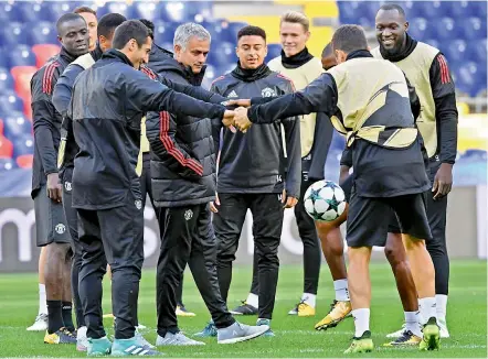  ??  ?? Manchester United coach Jose Mourinho and players at a training session in Moscow on Tuesday, the eve of their European Champions League Group ‘A’ football match against CSKA Moscow. — AFP