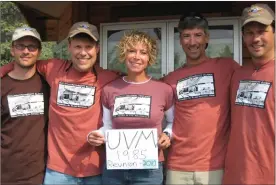  ?? Photo courtesy of Amy Daniels ?? WiSH Education Foundation Executive Director Amy Daniels, center, with her climbing team of Ross Nayduch, Joshua “Waz” Powers, Craig Mabie and Roger “Roddy” Lewis.