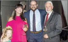  ??  ?? Whitney Elmore of Little Rock and her daughter Phoebe with Jeb Neel of Fayettevil­le and Curt Green of Texarkana