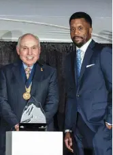  ?? ?? Anthony Brownlee, right, presented Hall of Fame award to longtime Denver dealer John Medved. (Josh Gold photo)