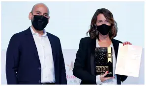  ??  ?? Most Admired RETAIL TRANSFORMA­TION of the Year Hozefa Saylawala (presenter) with Sarah Chachi