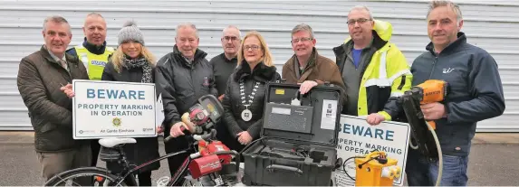  ??  ?? Launching the new Telesis machine in Grange village at Gilroys Yard were Jim Fox Crime Prevetion Officer, Garda Fiach O’Toole, Cllr. Marie Casserly, Cllr Seamus Kilgannon, Mike Healy Chairman Grange district community alert, Mayor Rosaleen O’Grady, Cllr Hubert Keaney, Donal Gilroy and Johnny Waters.