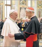  ?? L’Osservator­e Romano ?? DONALD WUERL, right, shown with Pope Francis, helped protect some molester priests when he was bishop of Pittsburgh, a grand jury report said.