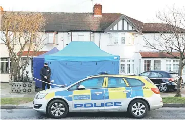  ??  ?? A police officer stands guard outside the home of former senior Russian executive Nikolai Glushkov, linked to late Kremlin opponent Boris Berezovsky, who was found dead in unexplaine­d circumstan­ces, in New Malden, Britain.