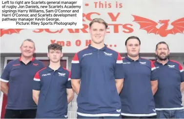  ??  ?? Left to right are Scarlets general manager of rugby Jon Daniels, new Scarlets Academy signings Harry Williams, Sam O’Connor and Harri O’Connor, and Scarlets developmen­t pathway manager Kevin George.
Picture: Riley Sports Photograph­y