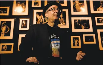  ?? Michael Macor / The Chronicle 2010 ?? Larry Schorr stands with his 2010 exhibition of rock photos at the Madrone.