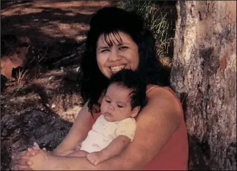  ?? THE FAMILY OF MELISSA LUCIO VIA AP PHOTO COURTESY OF ?? In this undated photograph, Texas death row inmate Melissa Lucio is holding one of her sons, John. Lucio is set to be executed on April 27 for the 2007 death of her 2-year-old daughter Mariah.