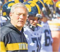  ?? DOUG MCSCHOOLER/ASSOCIATED PRESS ?? Formers Ravens assistant coach Kirk Ferentz is the winningest coach in Iowa football history with 144 victories in 20 seasons.