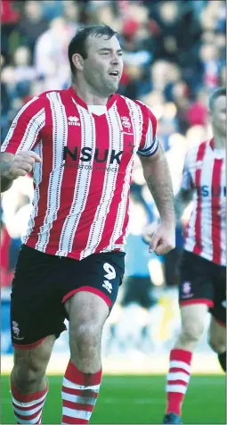  ??  ?? PRIDE: Matt Rhead celebrates scoring Lincoln’s goal