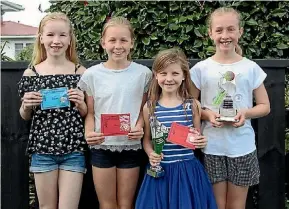 ?? EMMA JAMES/STUFF ?? Lily Wilkinson, Aimee Steele, Evie Wilkinson and Lucy Steele with their tap dancing awards.