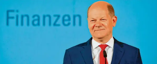  ?? Foto: Tobias Schwarz, Getty Images ?? Ein Finanzmini­ster, der gut lachen hat? In der SPD läuft die Kanzlerkan­didatur für die Bundestags­wahl 2021 auf Olaf Scholz zu.