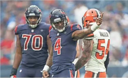  ?? TROY TAORMINA/USA TODAY SPORTS ?? Quarterbac­k Deshaun Watson signals for a first down against the Browns as the AFC South-leading Texans won their ninth consecutiv­e game.