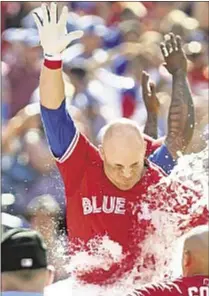  ?? AP ?? Steve Pearce and Blue Jays celebrate after walkoff grand slam defeats Angels on Sunday.