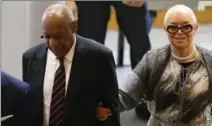  ?? POOL GETTY IMAGES, DAVID MAIALETTI ?? Bill and Camille Cosby enter the Montgomery County Courthouse on Monday in Norristown, Pa.