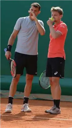  ?? FOTO PHOTO NEWS ?? David Goffin met Grigor Dimitrov, vandaag zijn dubbelpart­ner, morgen zijn tegenstand­er.