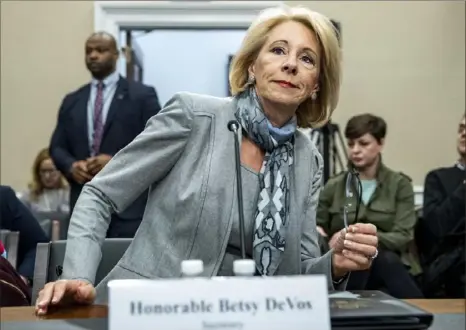  ?? Alex Brandon/Associated Press ?? Education Secretary Betsy DeVos announced Wednesday changes to campus sexual assault rules.