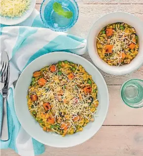  ??  ?? Creamy pumpkin and spinach risotto with sage is a great winter meal.