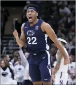  ?? CHARLES REX ARBOGAST — THE ASSOCIATED PRESS ?? Penn State’s Jalen Pickett celebrates during Friday’s 67-65 win over Northweste­rn in Chicago.