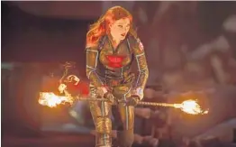  ?? FELD ENTERTAINM­ENT ?? Before joining Marvel Universe Live, Oviedo native Caitlin Hutson says she was “terrified of fire.” She plays Black Widow, a super agent, in “Age of Heroes.”