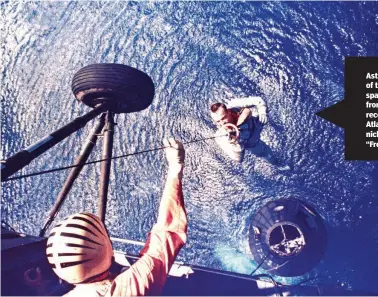  ??  ?? Astronaut Alan B. Shepard Jr., pilot of the Mercury-Redstone 3 suborbital spacefligh­t, is retrieved by a helicopter from the USS Lake Champlain during recovery operations in the western Atlantic Ocean May 5, 1961. Shepard nicknamed the the Mercury spacecraft “Freedom 7.”