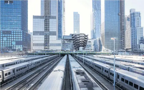  ?? AP ?? This photo taken on April 1, 2019 shows the Long Island Railroad storage yards and buildings at Hudson Yards in New York. Amazon.com Inc has signed a lease for a new office space in Manhattan that will house more than 1,500 employees, less than a year after pulling out of a deal for a larger headquarte­rs in the borough of Queens.