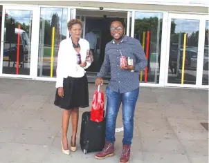  ??  ?? Brethren’s Keeper Internatio­nal Ministries leader, Apostle Victoria Samushonga welcomes gospel artiste, Mkhululi Bhebhe at the Harare Internatio­nal Airport last Thursday