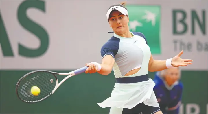  ?? ADAM PRETTY/GETTY IMAGES ?? Canada's Bianca Andreescu is moving on to the second round of the French Open after a 3-6, 7-5, 6-0 win Monday over Belgium's Ysaline Bonaventur­e.