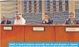  ??  ?? KUWAIT: Dr Yousef Al-Ebraheem (second left) chairs the panel discussion as Stephane Roudet (second right)and Warren Hauck (right) look on during the high-level symposium on “The Economic Policy Challenges Faced by Kuwait and the Arab World” on Tuesday.