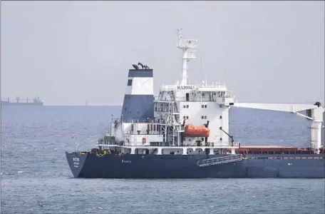  ?? Khalil Hamra Associated Press ?? THE CARGO ship Razoni is anchored in the Bosporus in Istanbul, Turkey, awaiting inspection. It is carrying Ukrainian corn.