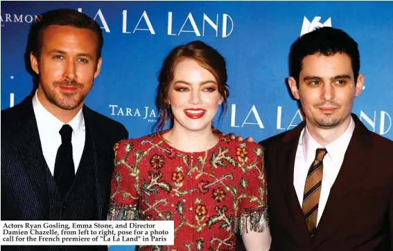  ??  ?? Actors Ryan Gosling, Emma Stone, and Director Damien Chazelle, from left to right, pose for a photo call for the French premiere of "La La Land" in Paris