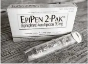  ?? Mark Zaleski / Associated Press ?? Mylan will pay the government $465 million to settle accusation­s it overbilled Medicaid for EpiPens, an emergency allergy injector.