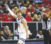  ?? Associated Press ?? Boise State guard Max Rice (12) celebrates after a 3-pointer in the first half against UNLV during the Mountain West Tournament, March 9, in Las Vegas.