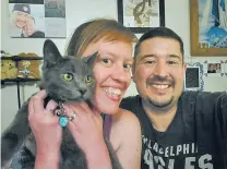  ??  ?? Nicole and Johnathon Gallegos with their new cat, Neptune.