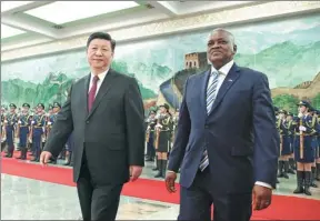  ?? FENG YONGBIN / CHINA DAILY ?? President Xi Jinping holds a welcoming ceremony for Botswanan President Mokgweetsi Masisi at the Great Hall of the People in Beijing on Friday.