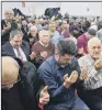  ?? PHOTO: AP ?? PRAYERS: Worshipper­s in a mosque pray for the victims of the shooting in Hanau.