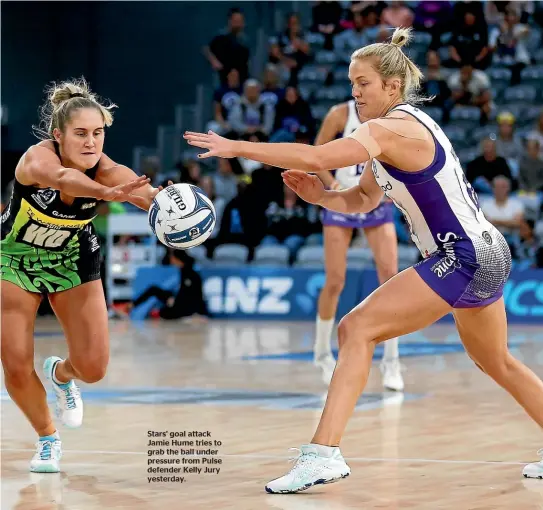  ??  ?? Stars’ goal attack Jamie Hume tries to grab the ball under pressure from Pulse defender Kelly Jury yesterday.