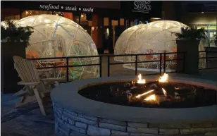  ?? Submitted photo ?? Some dining establishm­ents at Patriot Place now feature igloos for dining outside.