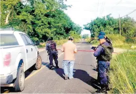  ?? ESPECIAL ?? El resguardo del lugar donde fue hallada una mujer muerta en Veracruz.