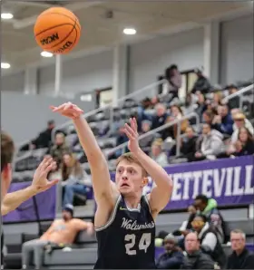  ?? (Special to NWA Democrat-Gazette/Brent Soule) ?? Bentonvill­e West senior Jaxson Brust takes a three-point shot against Fayettevil­le on Jan. 9. The Wolverines continue their five-game road swing tonight at Fort Smith Northside.