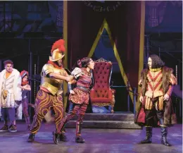  ?? T. CHARLES ERICKSON ?? Aztecs captured by their Spanish oppressors in “Kiss My Aztec!” at Hartford Stage.