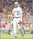  ?? AFP ?? Jake Arrieta of the Chicago Cubs walks towards the dugout during the game against the Pittsburgh Pirates on June 17.