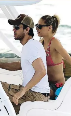  ?? FOTONEWS MIAMI ?? ENRIQUE IGLESIAS Y ANNA KÚRNIKOVA El cantante no fue a la boda de su hermana Ana Boyer y ahora se ha sabido que era porque su novia esperaba gemelos