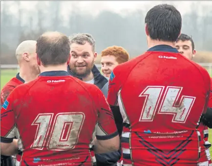  ?? Picture: Martin Longmuir ?? LEAGUE OF THEIR OWN: Craig Parslow (centre) with his Aberdeen Warriors players.