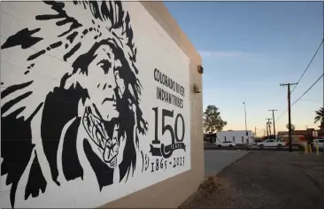  ?? PHOTO BY MIGUEL GUTIERREZ JR., CALMATTERS ?? A mural in Parker, Arizona, honors the Colorado River Indian Tribes. Some members of the tribes are concerned about hazardous waste California has been disposing at a nearby landfill.