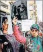  ?? AFP FILE ?? Lebanese protesters in Beirut hold up photos of kids affected by the war in Yemen.