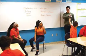  ??  ?? ■ TOP RIGHT: Marshall Motsenbock­er, standing right, a researcher at UT Southweste­rn Medical Center, leads a session Nov. 15, 2018, at the Dallas school.