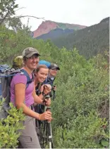  ?? NATHAN LAMM ?? Chelsey Lewis (from front), Courtney Lammand Erin Caughey backpack the Four PassLoop in Colorado's Maroon Bells-Snowmass Wilderness.
